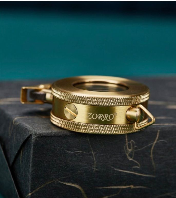 Кругла бензинова запальничка Zorro із латуні