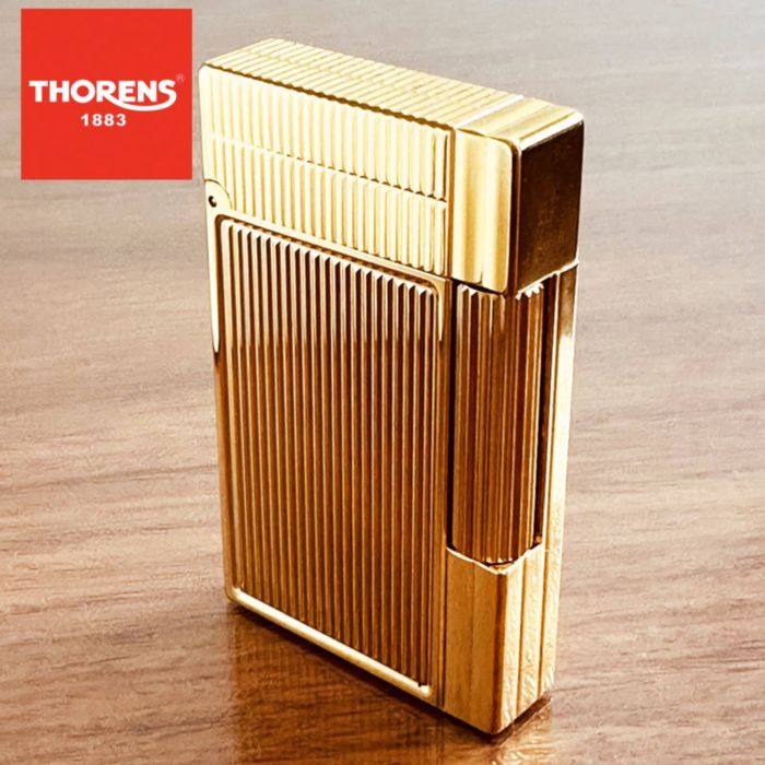 Класична газова запальничкаThorens золотого кольору