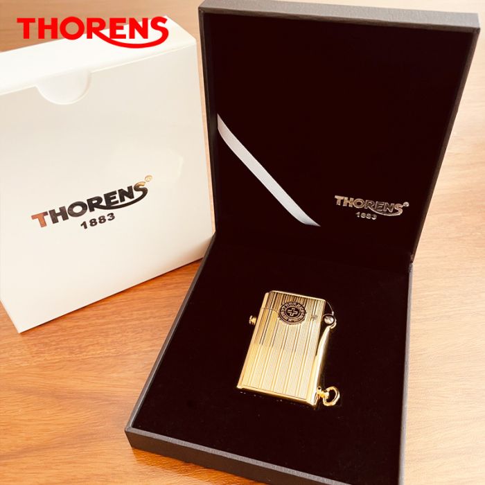 Вишукана бензинова запальничка Thorens золотого кольору
