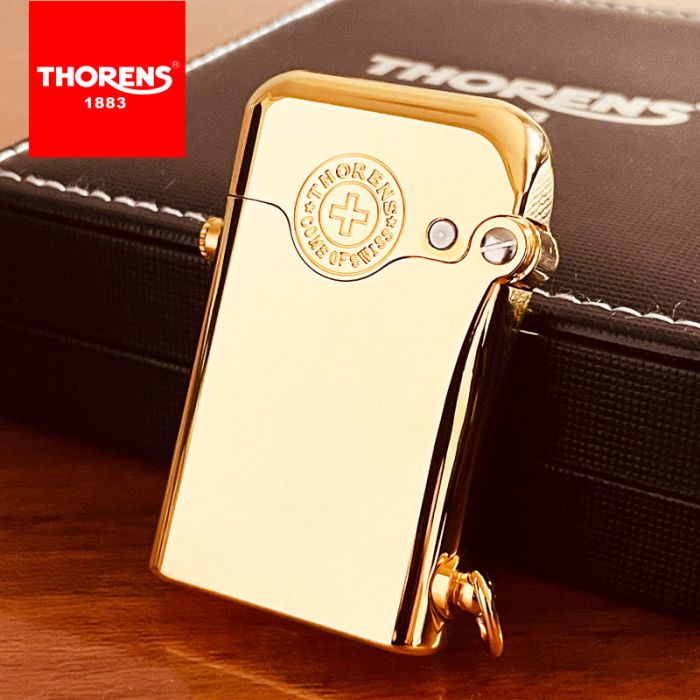 Вишукана бензинова запальничка Thorens золотого кольору