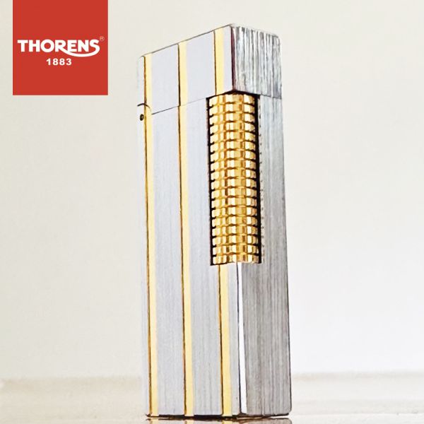 Вишукана газова запальничка Thorens у  срібно-золотистому кольорі
