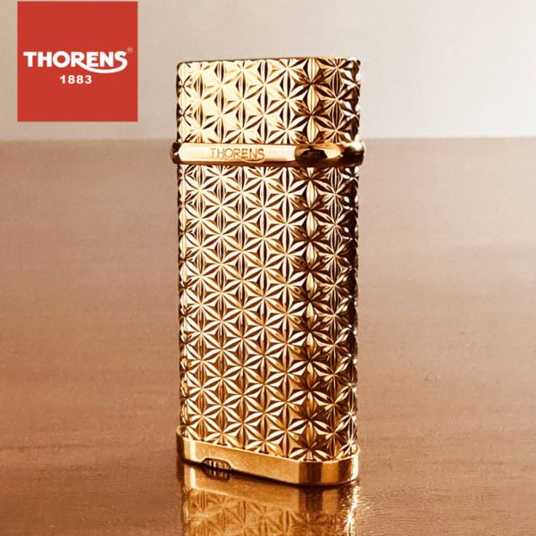 Розкішна золотиста газова запальничка Thorens з вишуканим орнаментом