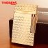 Газова запальничка Thorens з об"ємним геометричним візерунком золотиста